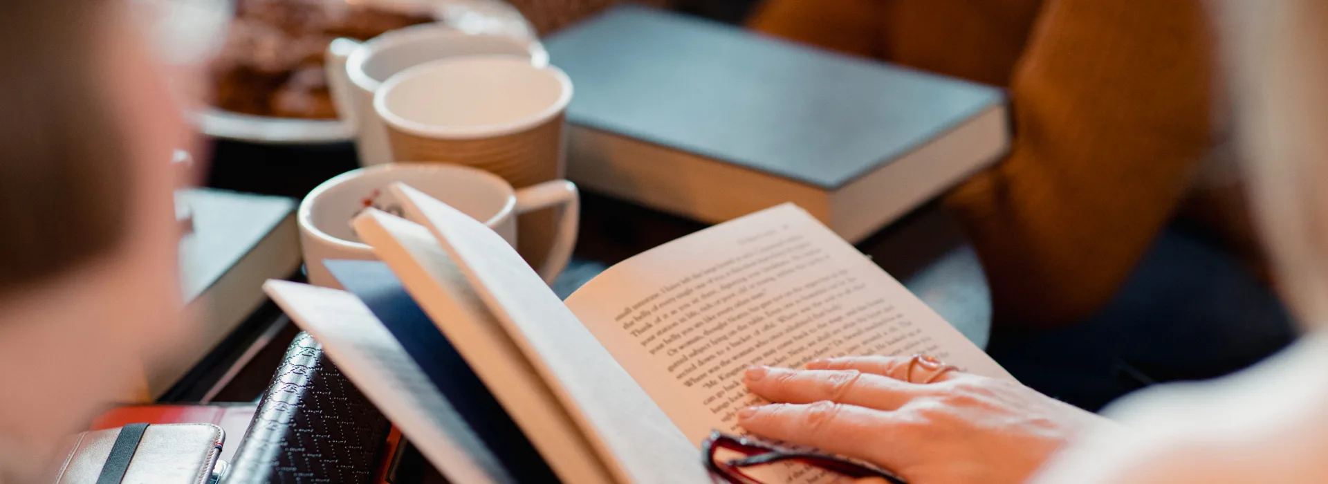 hand holding book open
