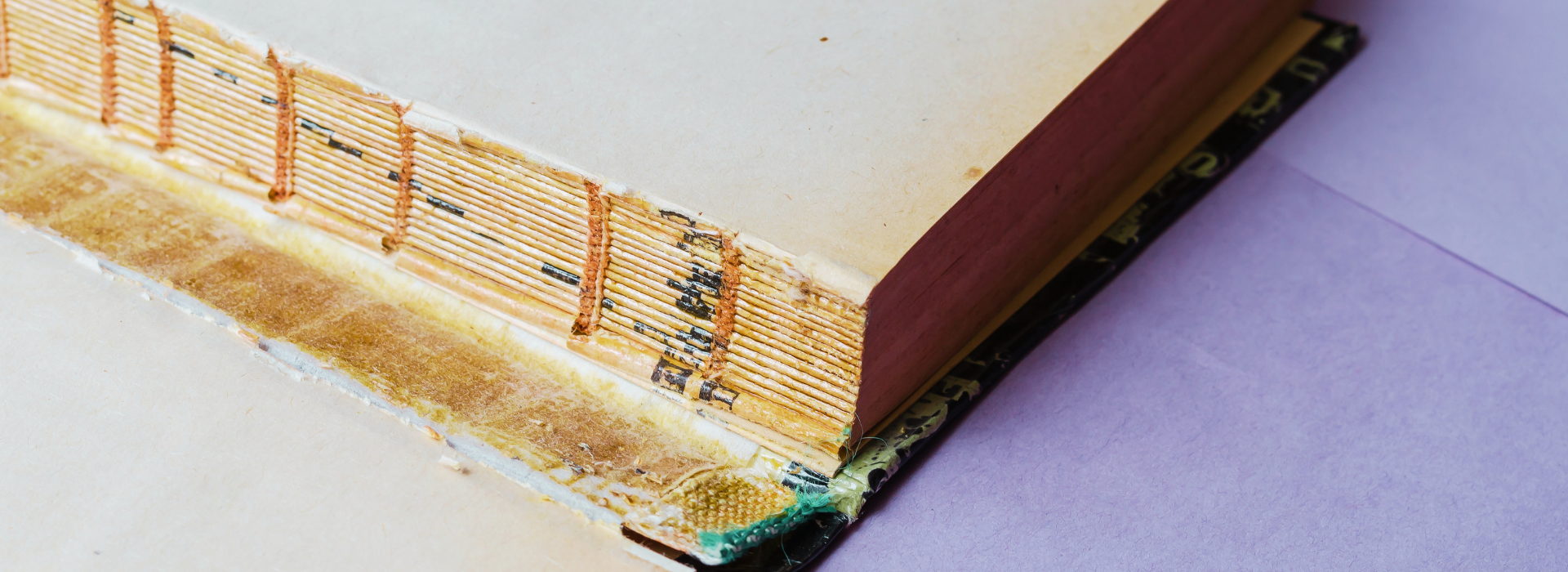book laying with broken spine