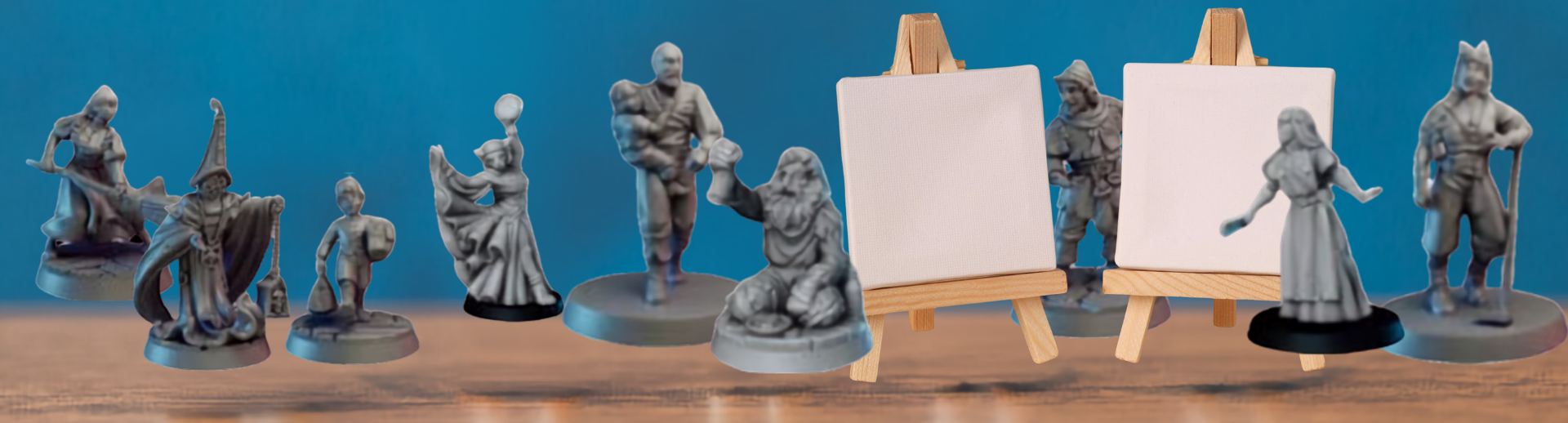mini dungeons and dragons figures next to miniature canvases on easels.