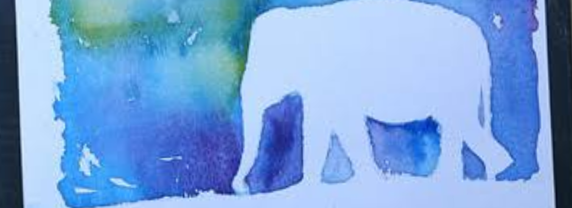 Elephant in negative space of watercolor paint